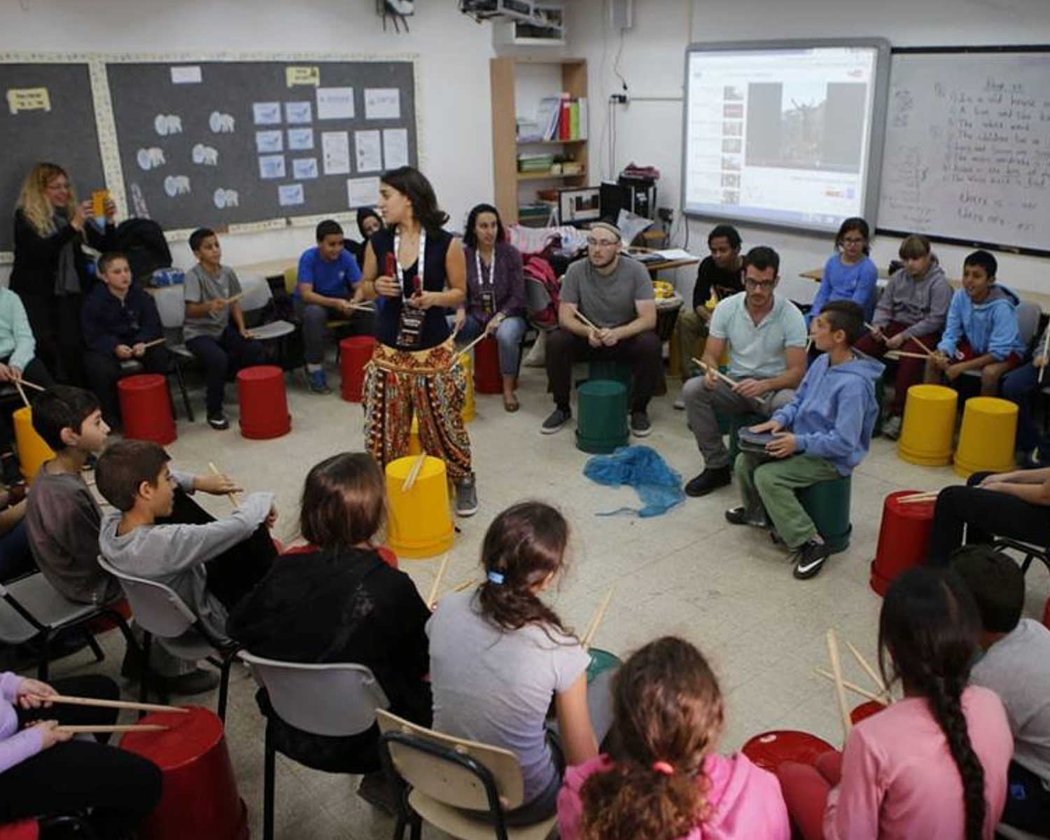 Hands-on music workshop in progress with instruments and participants